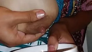Mexican girl milking her tits