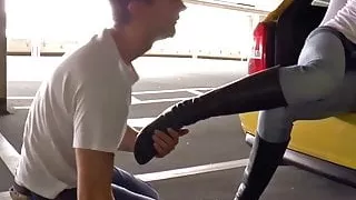 Exposed slave in public parking lot