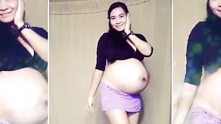 Dancing and Teasing Pregnant Babe