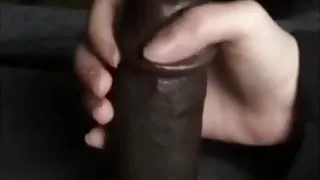 Friend helps black cock with handjob