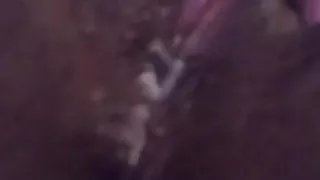 She's playing with her tight pussy