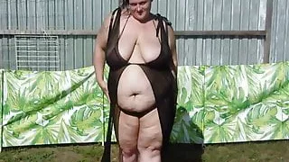 bbw wife striping and rubing babyoil on her body