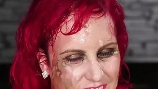 Redhead brit cocksucking in group for bukkake