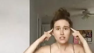 Busty babe doing a little dance - Who is she ?