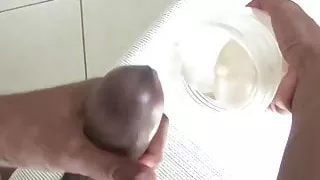 Cute black guy plays with his big black cock and fleshlight