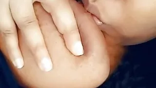 Marilyn Licking her Tits