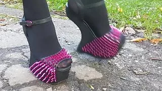 Lady L walking with exotic extreme high heels.