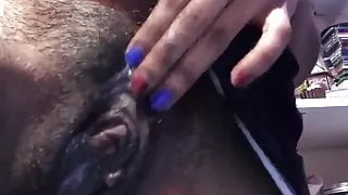 Chocolate Chick Stretcing Her Pussy