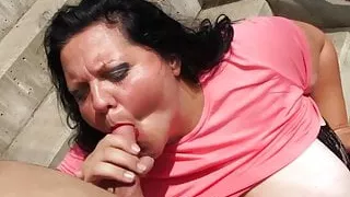 Obese grandma deepthroats young boy outdoors