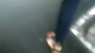 Woman in jeans in the metro