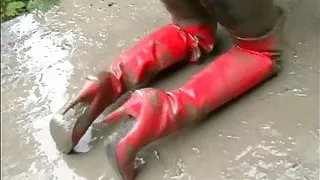 Sasja in muddy red thigh boots!!!