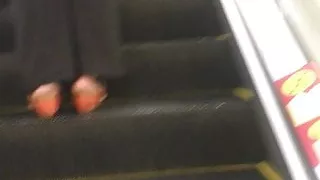 Escalator lady