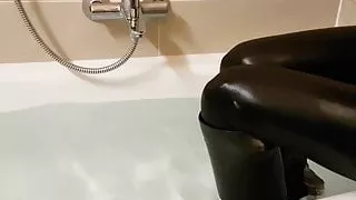 Versace high heel leather boots soaking wet