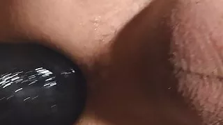 Horny little ass fucked by a huge black dildo and likes it