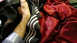 Playing in satin pajamas, satin sheets and Adidas shorts