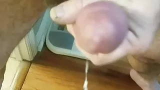 Hand job in front of a mirror