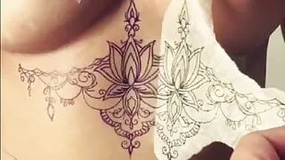 big tits babe getting inked