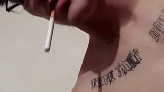 Nerdy stud Lex exhales smoke during masturbation