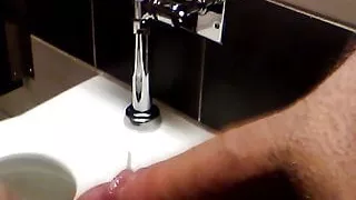 young blonde girlfriend  sucking in public restroom