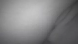 Petite girl takes a piss through her shaved pussy