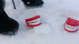 Winter crush: Lady L  crush teeth with sexy black boots.