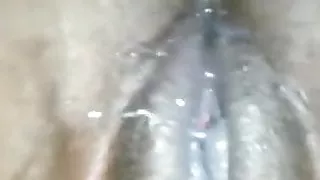 Ebony fingering her pussy to orgasm