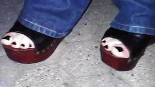 platform wedges and black toenail polish