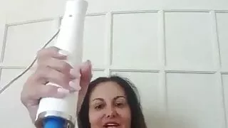 Gorgeous MILF playes with her magic wand.