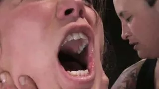 Asian woman is fisted by two ladies