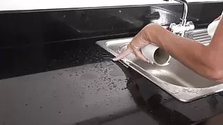 mature granny pissing in sink