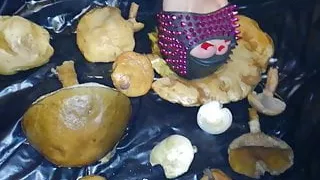 Lady L crush  mushrooms with extreme gaga high heels.
