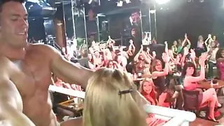 Gorgeous CFNM babes tugging strippers dong