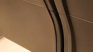 Tit sliding out in subway