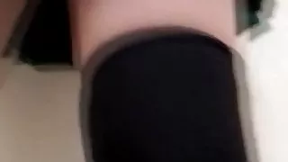 Asian cutie lifts her skirt up to show how she pees