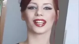 Sexy redhead smokes cork