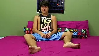 Young cutie Tristan Tyler plays with his ass and cock