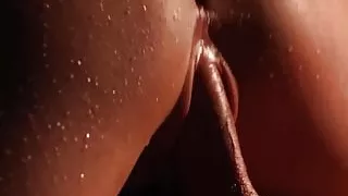 Erotic couple making love until her sexy belly gets creamed