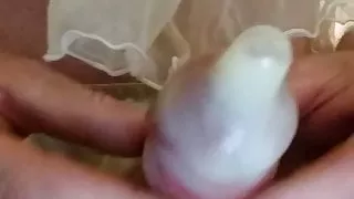 Condom cumshot wearing my sexy satin panties