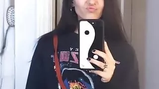 Victoria Justice in black shirt and pants.