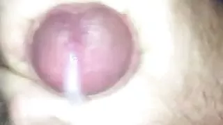 Stroking my cock in bed next to my wife till cum