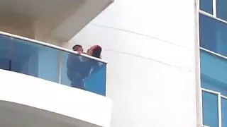 Couple fucking on balcony