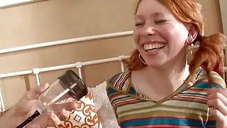 Redhead teen in pigtails gets her wet pussy pumped