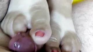 Footjob on a hammock