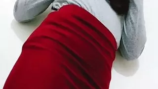 Crossdresser Teasing in Red Pencil Skirt and Pantyhose