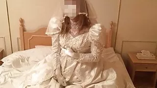 Wedding dress masturbation on bed