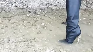 Versace metal heel leather boots in the river!