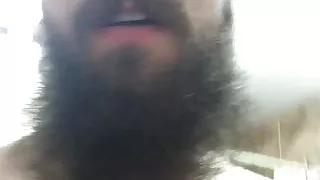 bearded guy cums in bathroom