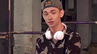 Roped down twink gets a gas mask and a rough handjob