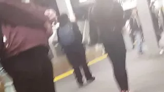 Petite cutie waiting for the train