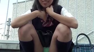 Japanese schoolgirls hide in the back yard to toy pussies